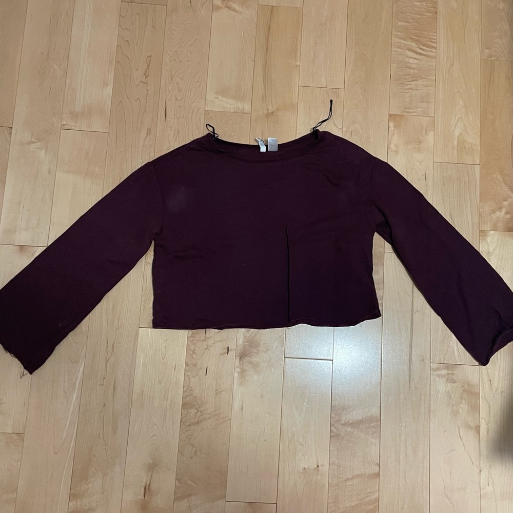 H&M cropped burgundy bell sleeve shirt. Size small.